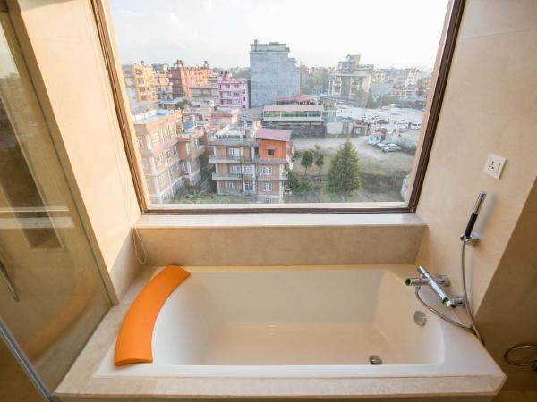 Akama Hotel Ltd : photo 6 de la chambre deluxe king/twin