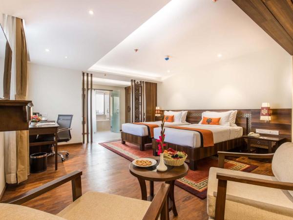 Akama Hotel Ltd : photo 1 de la chambre deluxe king/twin