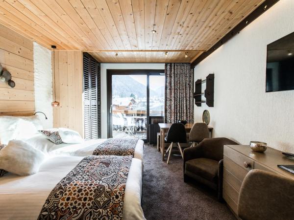 Hôtel La Bergerie : photo 10 de la chambre chambre familiale l (2 adultes + 2 enfants)