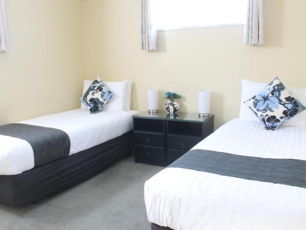 ASURE Abbella Lodge Motel : photo 5 de la chambre appartement 2 chambres avec baignoire spa