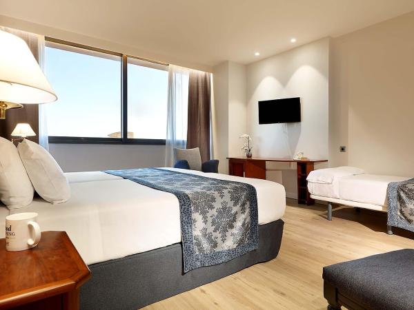 Exe Isla Cartuja : photo 2 de la chambre chambre triple