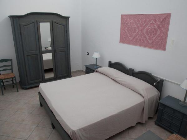 Residence Hotel Monte Ricciu : photo 7 de la chambre chambre triple