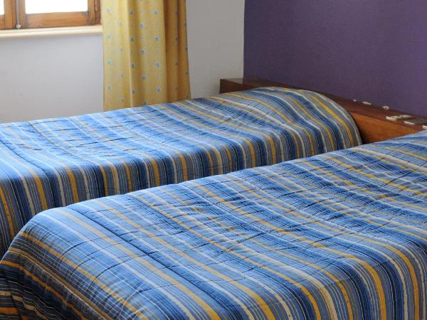 Residencial Moderna : photo 2 de la chambre chambre lits jumeaux