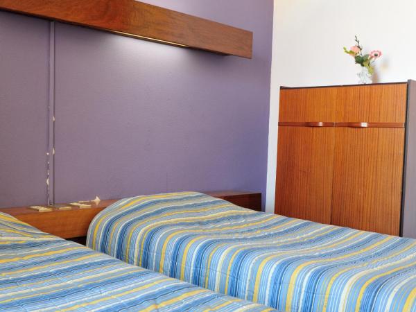 Residencial Moderna : photo 3 de la chambre chambre lits jumeaux