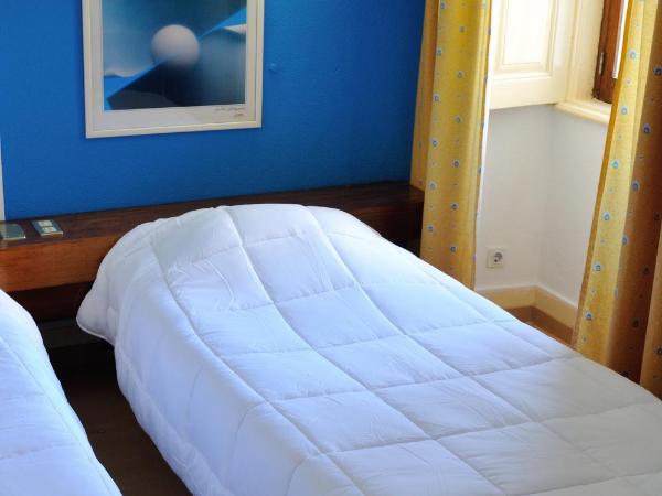 Residencial Moderna : photo 6 de la chambre chambre lits jumeaux