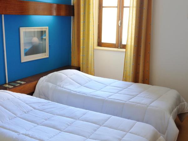 Residencial Moderna : photo 4 de la chambre chambre lits jumeaux