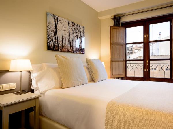 Ikonik Plaza Mercado : photo 1 de la chambre chambre double standard