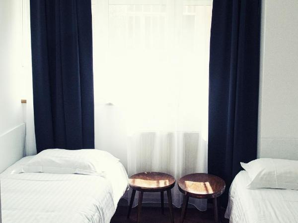 The Old Hotel Ravel Centre : photo 2 de la chambre chambre lits jumeaux avec accès gratuit au jacuzzi