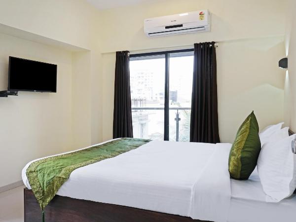 Treebo Lotus Baner : photo 6 de la chambre [sanitized] deluxe double room