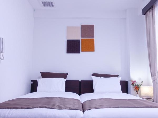 COCORO HOTEL : photo 2 de la chambre chambre lits jumeaux