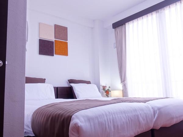 COCORO HOTEL : photo 3 de la chambre chambre lits jumeaux