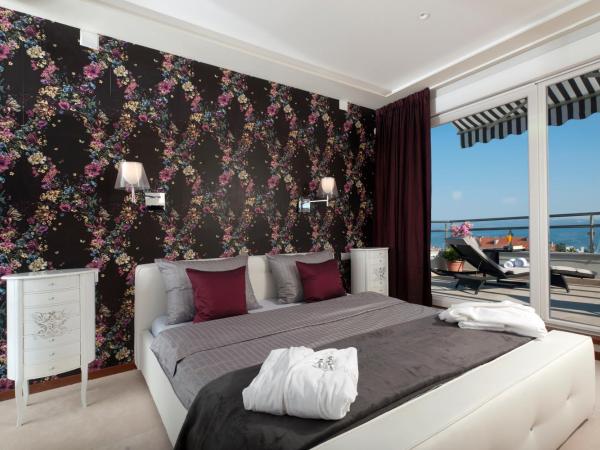 Boban Luxury Suites : photo 3 de la chambre suite avec baignoire spa et terrasse - vue sur mer