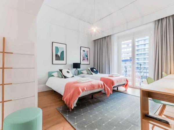 NLC Rooms & Suites : photo 1 de la chambre chambre lits jumeaux avec balcon