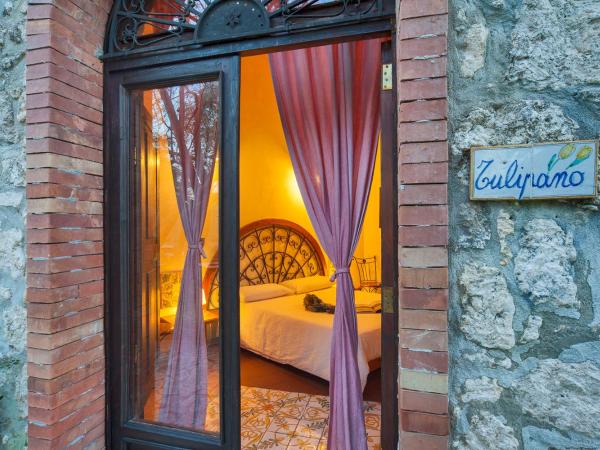 Villa Dei Papiri Fonte Ciane : photo 5 de la chambre chambre double supérieure avec terrasse