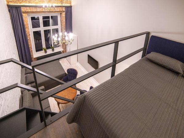 MoHo L : photo 4 de la chambre chambre familiale avec salle de bains privative