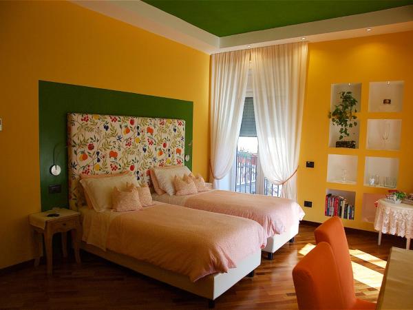 Il Giardino Segreto : photo 2 de la chambre chambre double ou lits jumeaux supérieure - vue sur jardin