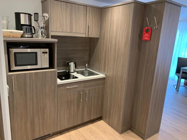 Gästehaus Alpinia : photo 5 de la chambre chambre double deluxe avec douche