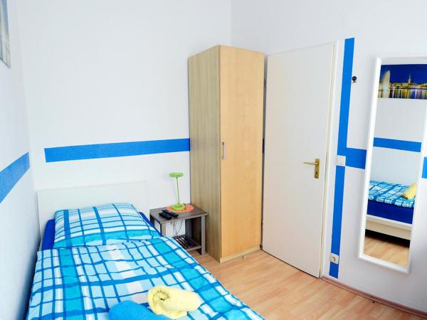 Basement Küchgarten : photo 2 de la chambre chambre simple avec toilettes et douche communes