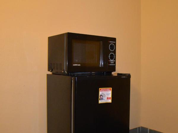 Economy Inn New Orleans : photo 4 de la chambre chambre lit king-size