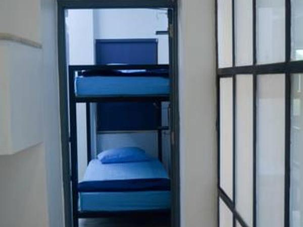 THC Backpackers jodhpur : photo 2 de la chambre chambre lit king-size avec balcon