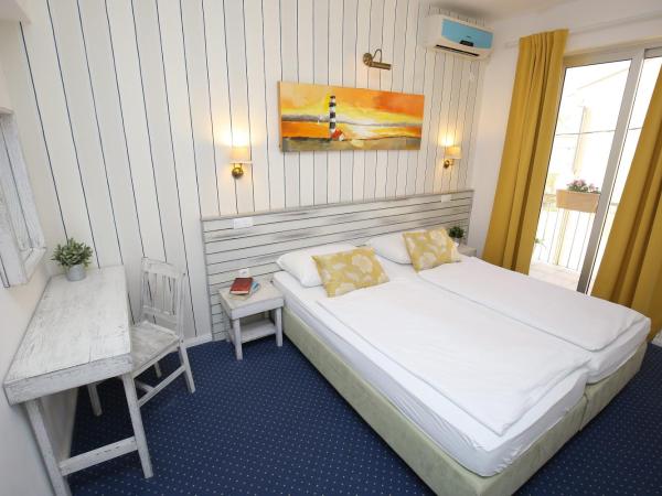 Hotel Delfin : photo 4 de la chambre offre spéciale - chambre double ou lits jumeaux avec balcon - forfait bien-Être & sport