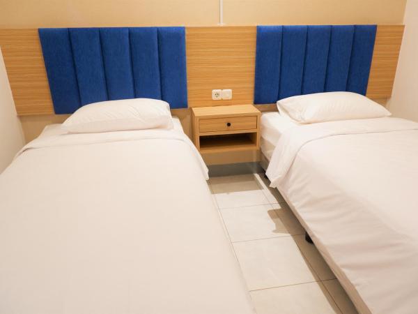 Kokonut Guesthouse : photo 3 de la chambre chambre lits jumeaux standard