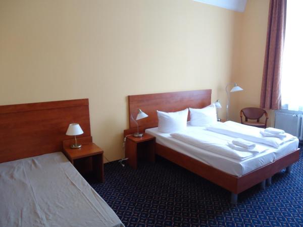 City Hotel am Kurfürstendamm : photo 1 de la chambre chambre triple standard