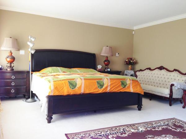 Harmony House : photo 2 de la chambre chambre lit king-size avec baignoire spa