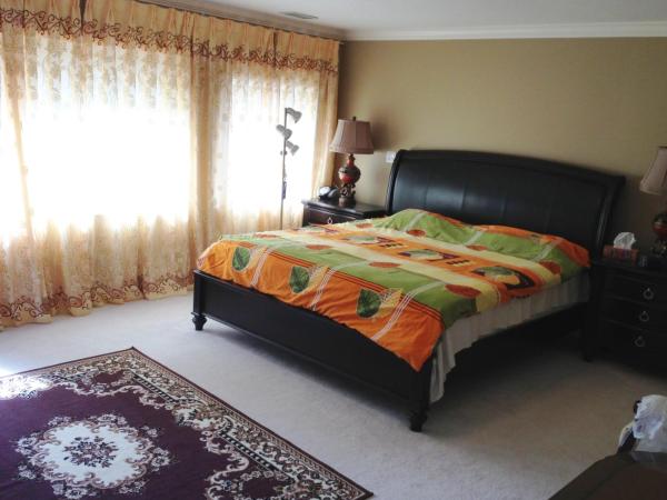 Harmony House : photo 3 de la chambre chambre lit king-size avec baignoire spa