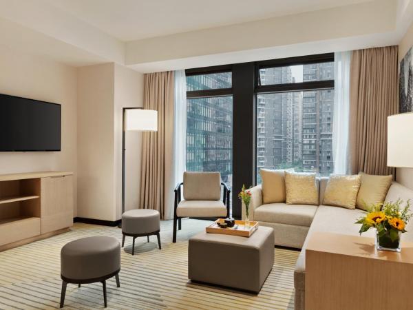 Hyatt Place Chengdu Pebble Walk : photo 5 de la chambre suite lit king-size avec canapé-lit