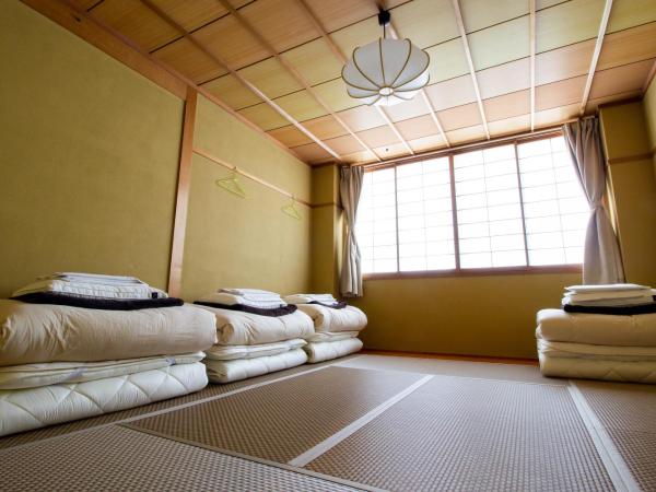 Trip & Sleep Hostel : photo 4 de la chambre chambre quadruple de style japonais avec salle de bains commune