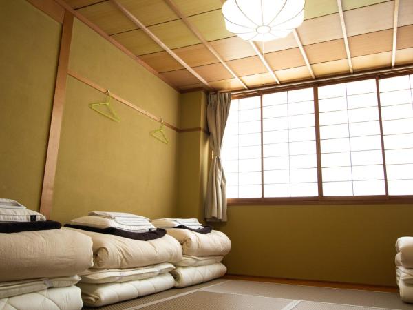 Trip & Sleep Hostel : photo 6 de la chambre chambre quadruple de style japonais avec salle de bains commune