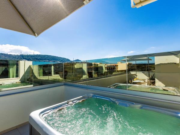 Atrium Ambiance Hotel : photo 9 de la chambre suite exécutive avec jacuzzi