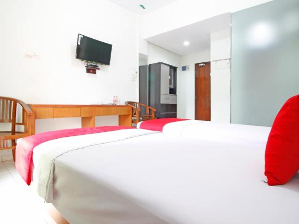 RedDoorz @ Turangga Sari : photo 4 de la chambre chambre lits jumeaux