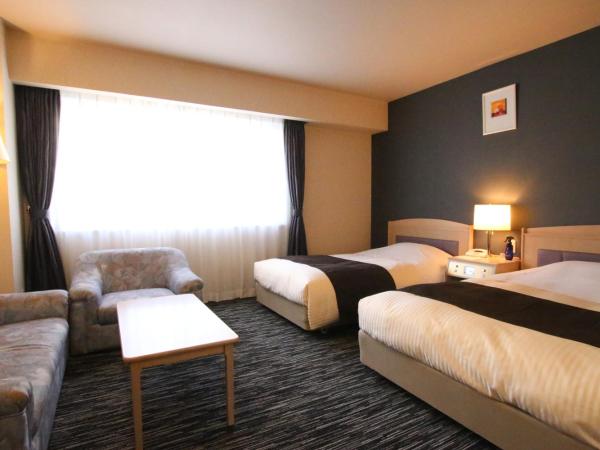 Kotoni Green Hotel : photo 1 de la chambre chambre lits jumeaux spacieuse - non-fumeurs