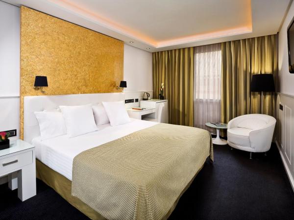 Hotel Colón Gran Meliá - The Leading Hotels of the World : photo 6 de la chambre chambre deluxe