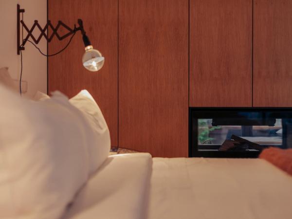 Rosa Et Al Townhouse : photo 9 de la chambre chambre double ou lits jumeaux deluxe – vue sur jardin