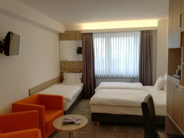 Hotel Empire : photo 1 de la chambre chambre triple