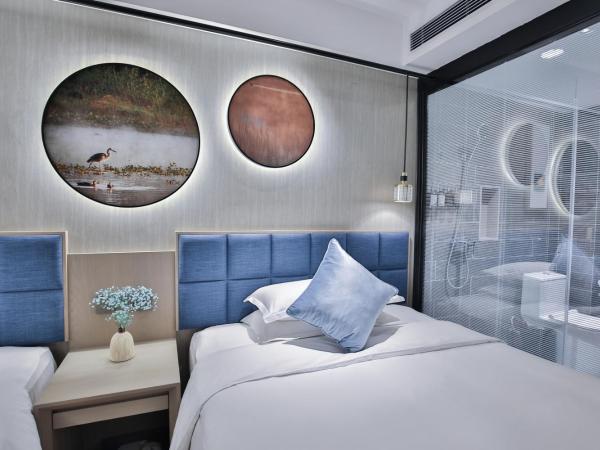 SSAW Boutique Hotel Hangzhou Ant Z-space : photo 1 de la chambre chambre double avec 2 lits doubles