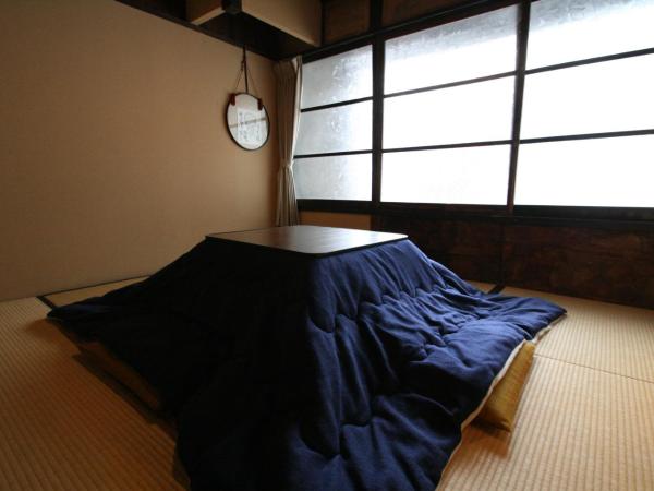 HARUYA Umekoji : photo 1 de la chambre chambre lits jumeaux de style japonais avec salle de bains commune