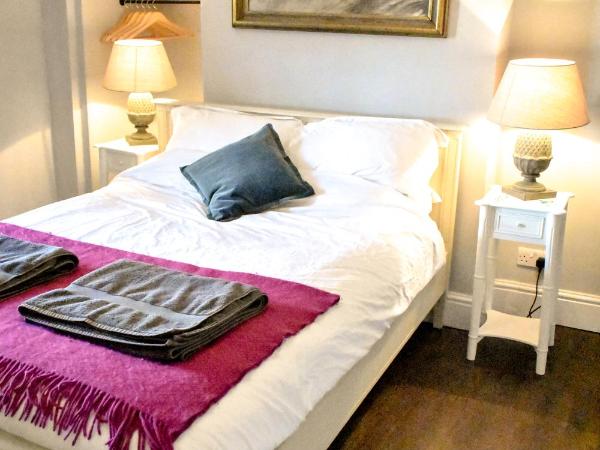 The Dark Horse Pub : photo 5 de la chambre chambre lit king-size