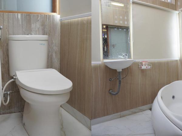 Super OYO 444 Rafitha Homestay : photo 6 de la chambre chambre double deluxe