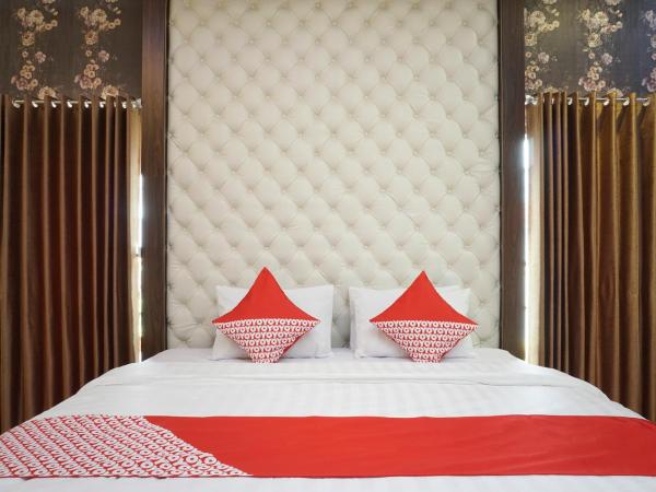 Super OYO 444 Rafitha Homestay : photo 6 de la chambre suite deluxe