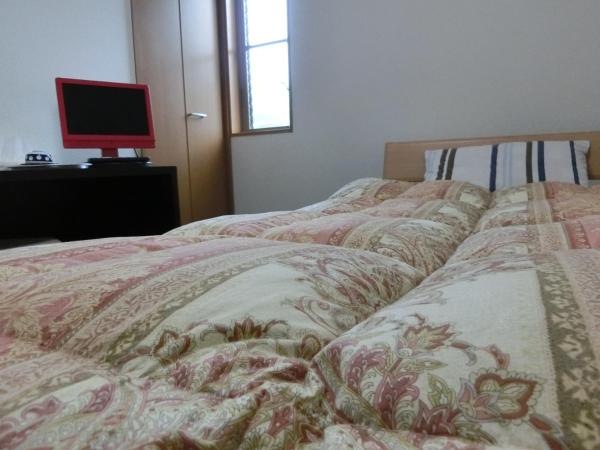 Ryokan Suzukisou-10 tatami mats room No bath and toilet- Vacation STAY 17872 : photo 7 de la chambre studio