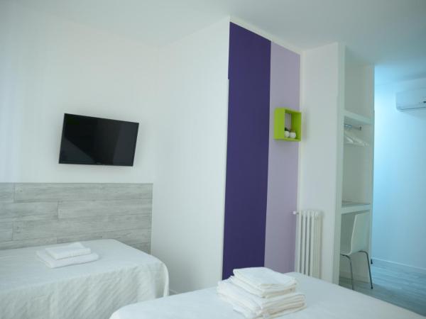 Nersan : photo 3 de la chambre chambre triple avec salle de bains privative