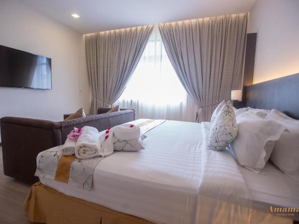 Amamas Boutique Hotel Kuching : photo 6 de la chambre chambre lit king-size supérieure