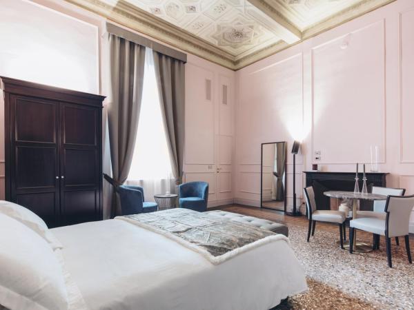 Gregorini Bingham Art Luxury Suites : photo 3 de la chambre suite deluxe avec lit king-size
