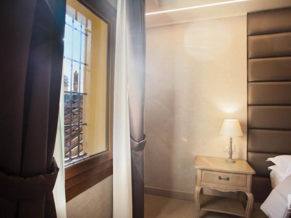 Hotel Cavour : photo 4 de la chambre chambre deluxe double ou lits jumeaux