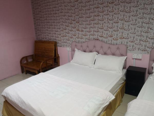 Home Inn Hotel : photo 3 de la chambre chambre familiale avec salle de bains privative