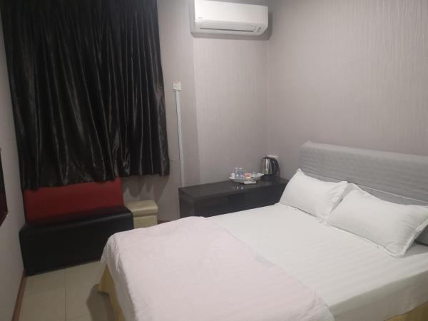 Home Inn Hotel : photo 4 de la chambre chambre double deluxe avec baignoire